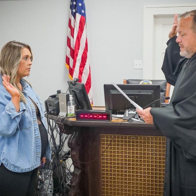 NEW INTERIM PROSECUTOR — Judge Matthew Wilson administers the oath of office to Chelsea Fellinger on Thursday morning, May 21, at the Lewis County Courthouse after appointing her interim Knox County prosecuting attorney. Fellinger currently serves as Lewis County prosecutor. Photo by Echo Menges