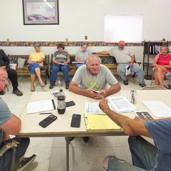 PUBLIC INPUT — Hurdland residents filled City Hall on Thursday, July 16, to discuss whether the city should pursue purchasing its sewer system from the Knox County Public Water Supply District. Following discussion, residents unanimously supported moving forward with negotiations, and the Hurdland City Council approved a motion directing city officials to attempt to buy back the system. Photo by Echo Menges